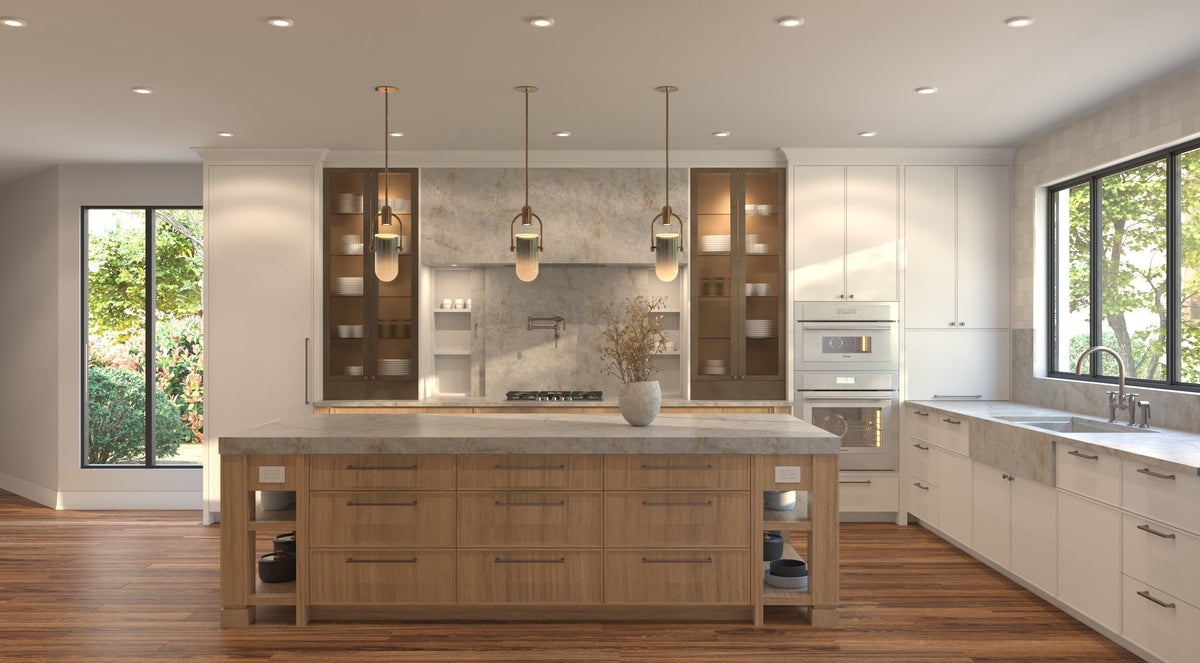 Kitchen with lit fluted glass pendants over a marble island and glowing display cabinets against a stone backsplash