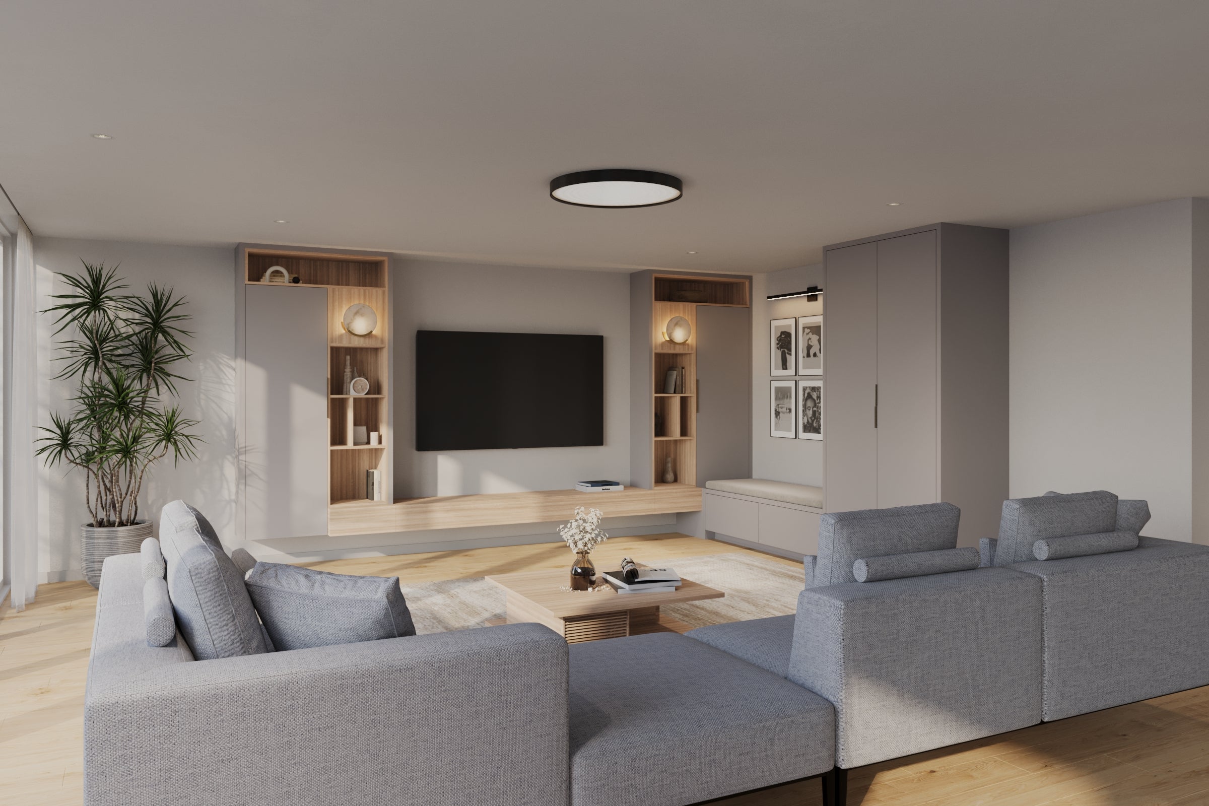 Modern living room with gray sofa, TV, and decorative elements.