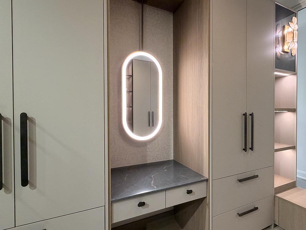 Spacious, modern, custom walk-in closet showroom, illuminated by soft ambient lighting